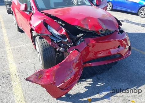 2023 Tesla Model Y Awd/Long Range Dual Motor All-Wheel Drive z USA, uszkodzony, nr VIN 7SAYGDEE4PF623615